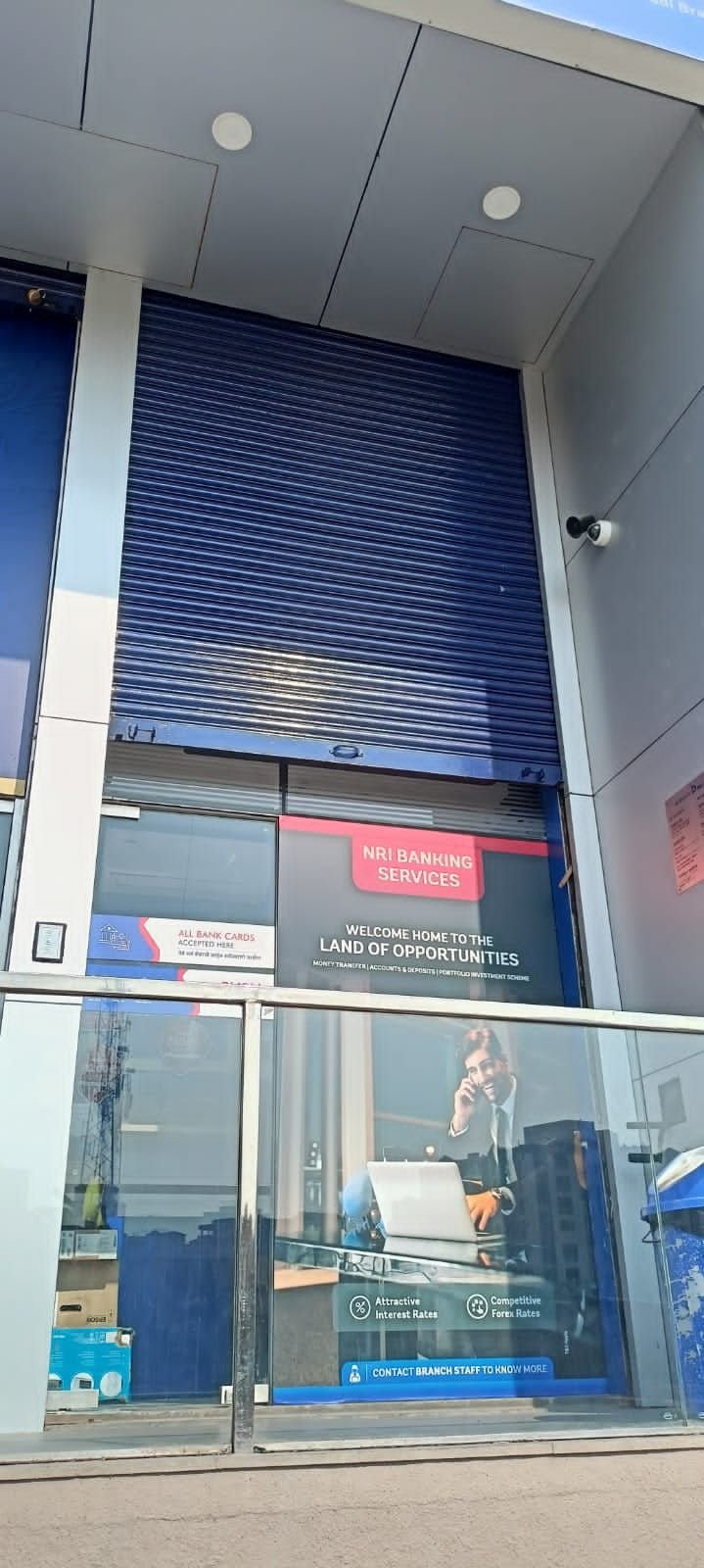 Rolling shutter repaired - bank branch, Baner