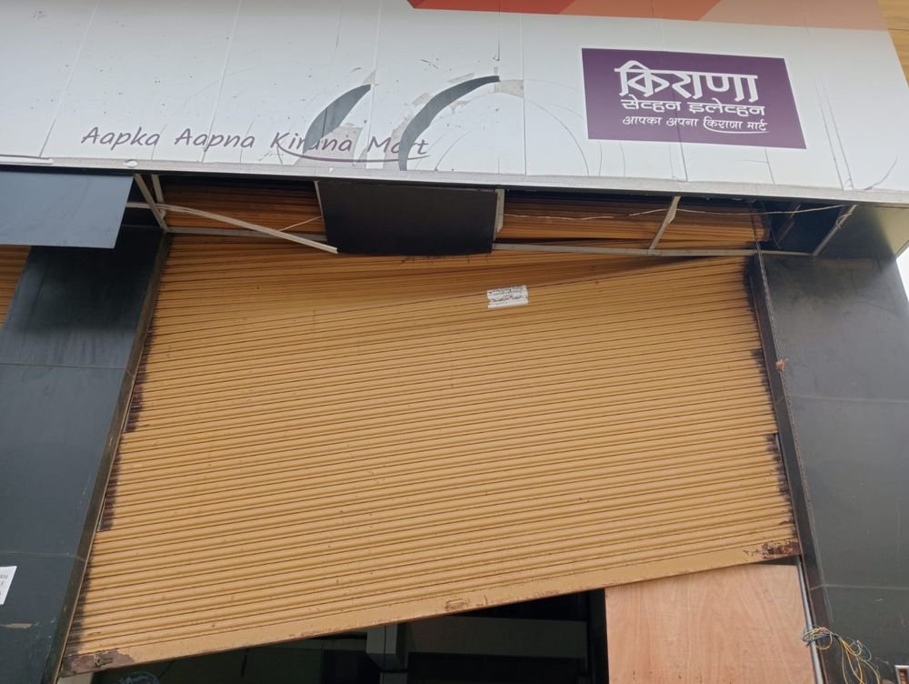 Rolling shutter repair completed - kirana store, Pune